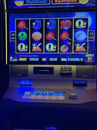 Live baccarat table with professional dealer revealing cards to mobile audience